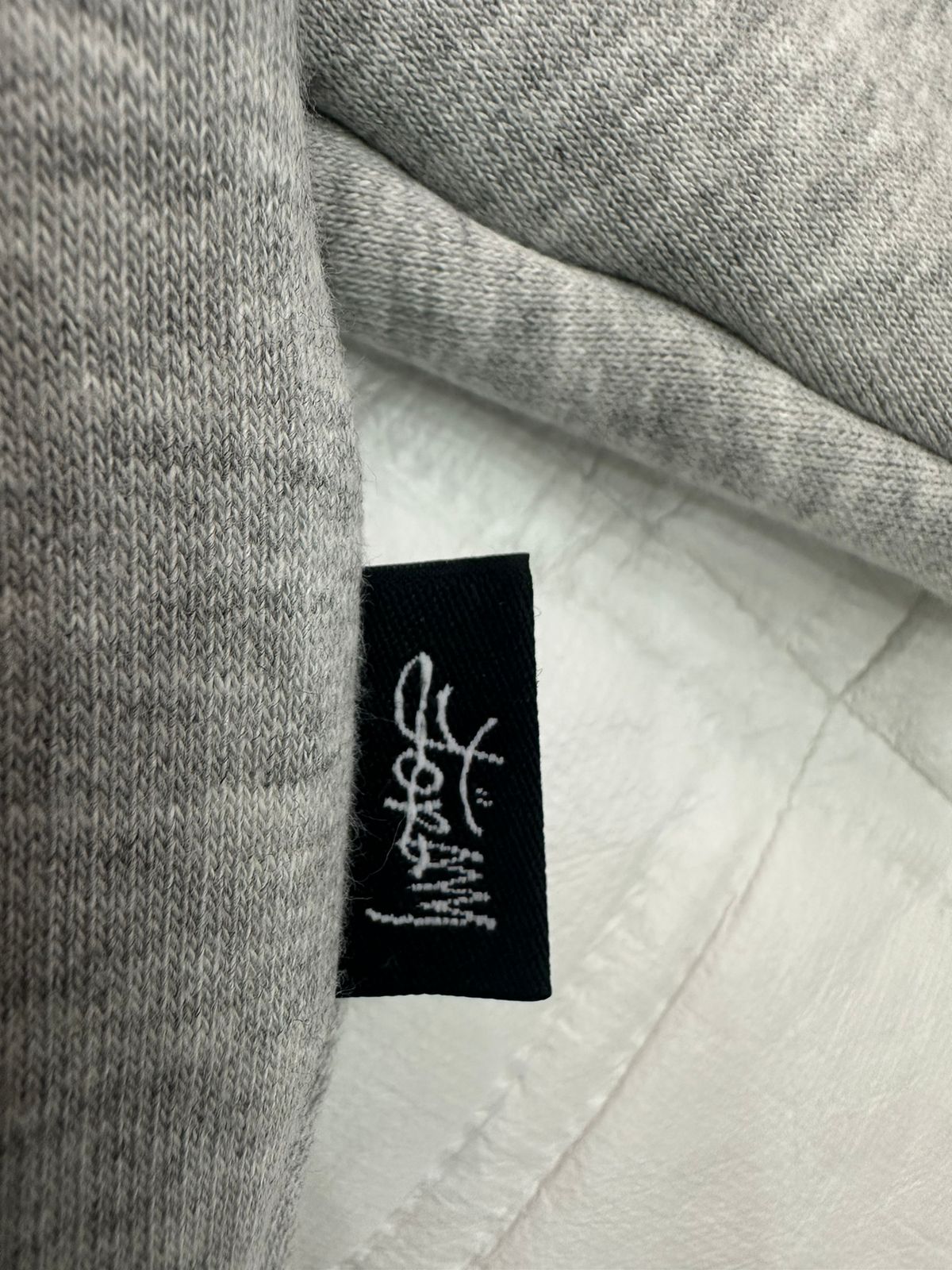 buzo hoodie dif x curva gris melange