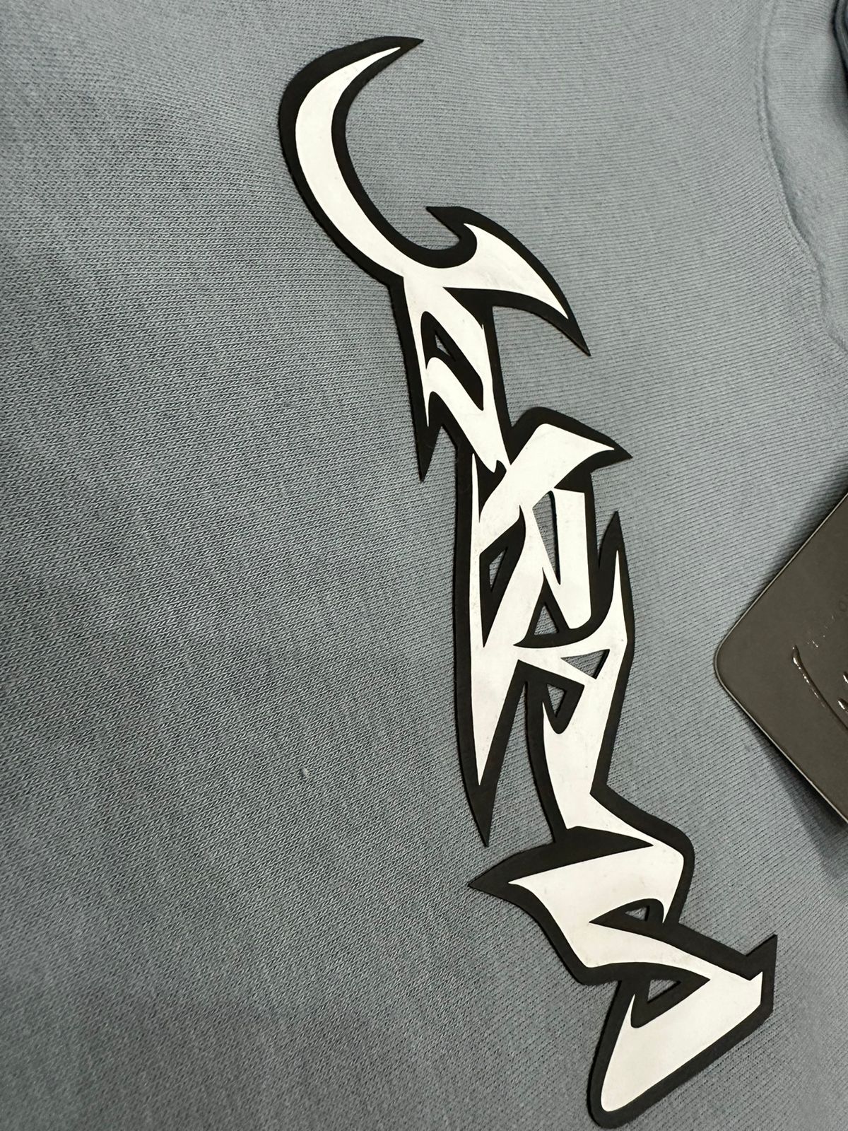 buzo hoodie urb x curva azul verdoso